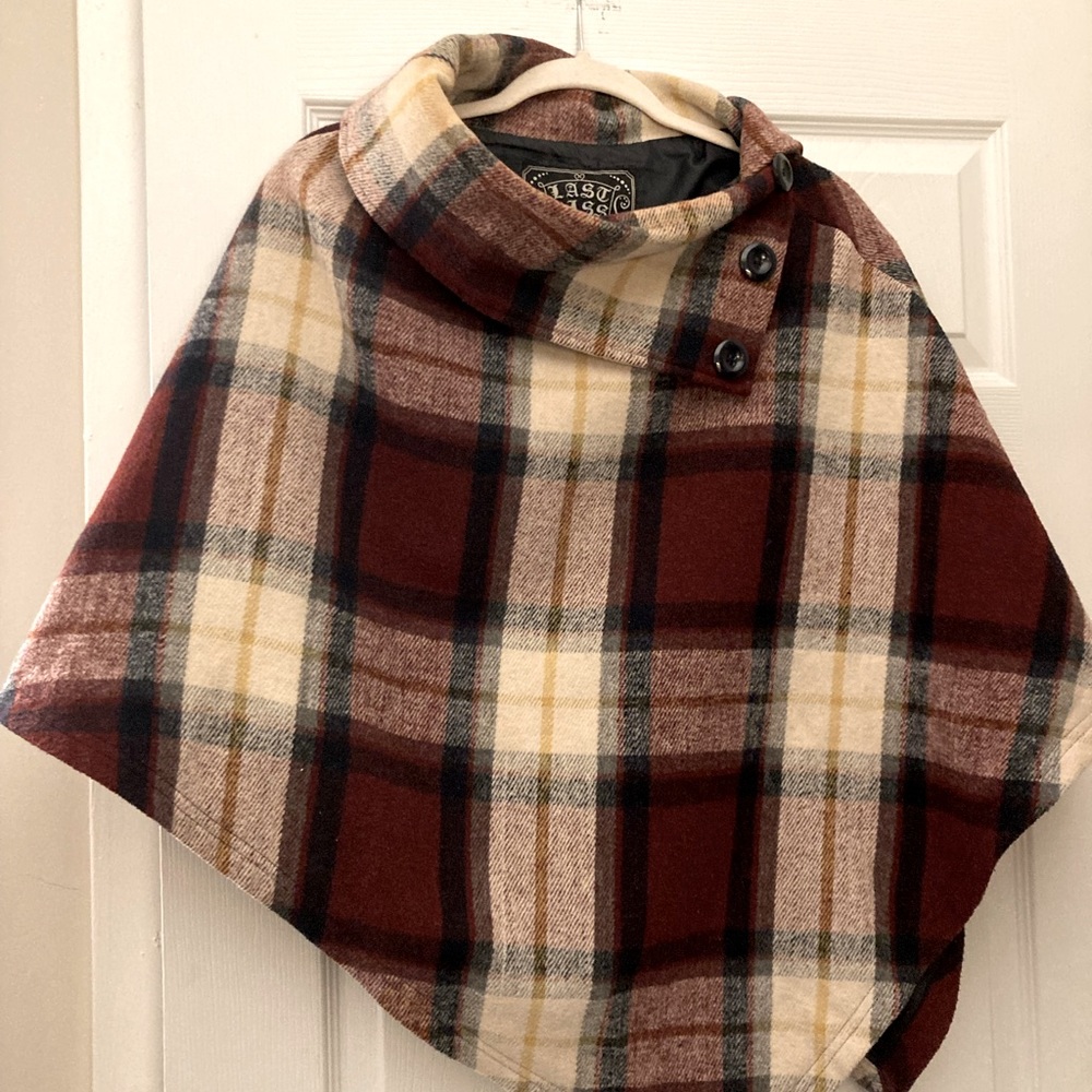 Burgundy white and blue checked poncho.